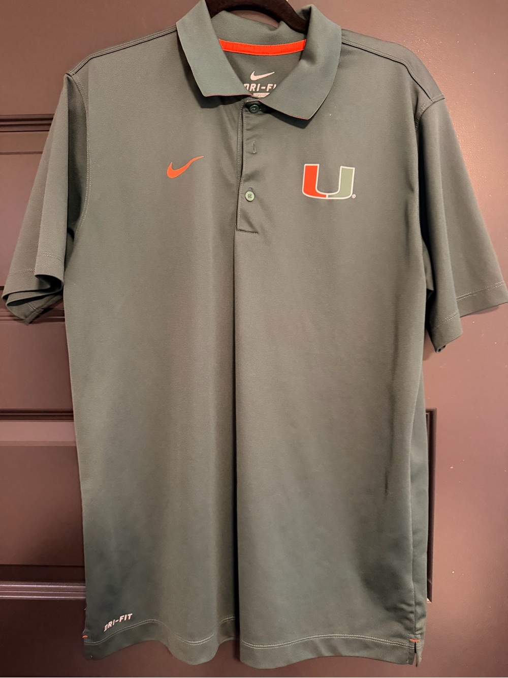 Nike Dri-FIT Miami Hurricanes Green Polo with Orange Accents